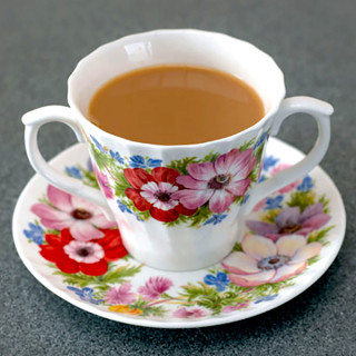 Two handled china cup and saucer AA5729